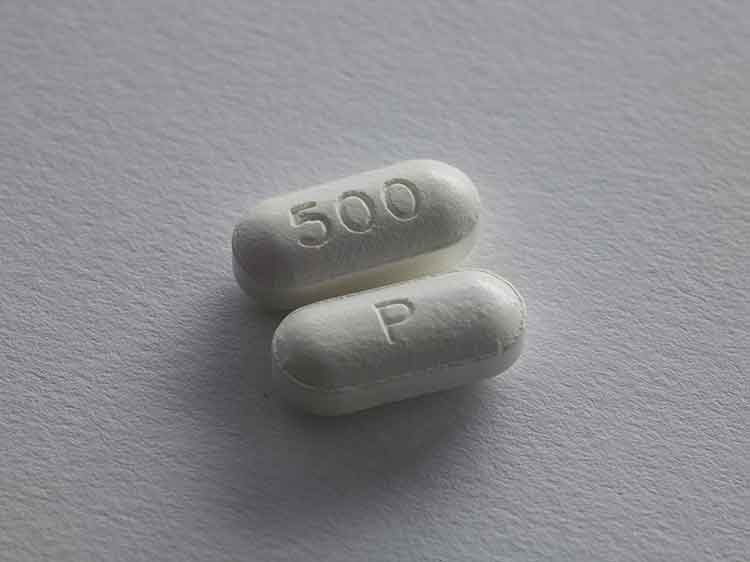 two white medicine tablets