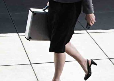business woman walking with briefcase